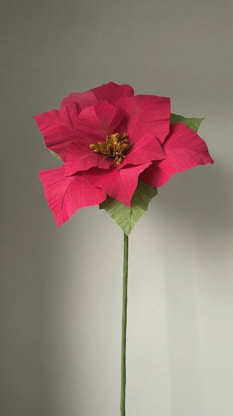 Giant paper poinsettia made with the PDF tutorial